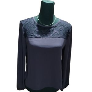 Leading lady Purple long-sleeved women's blouse with a lace yoke.